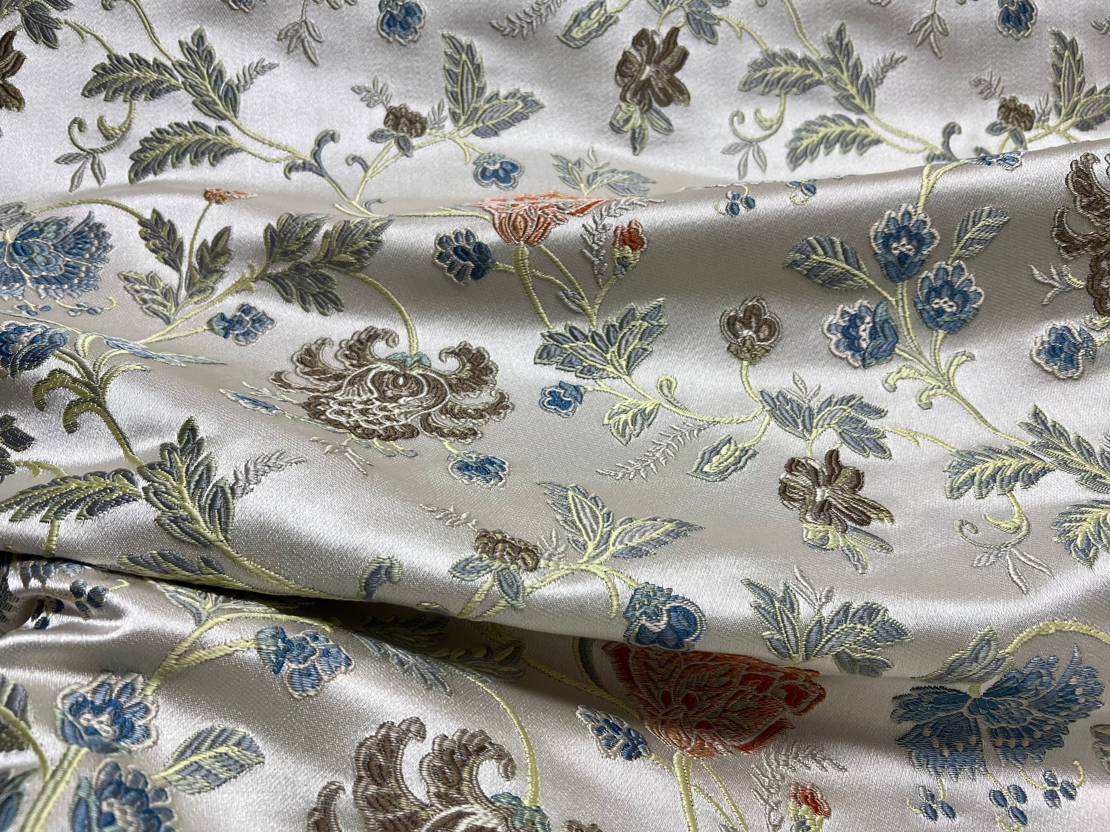 Embroidered Brown floral pattern on fabric