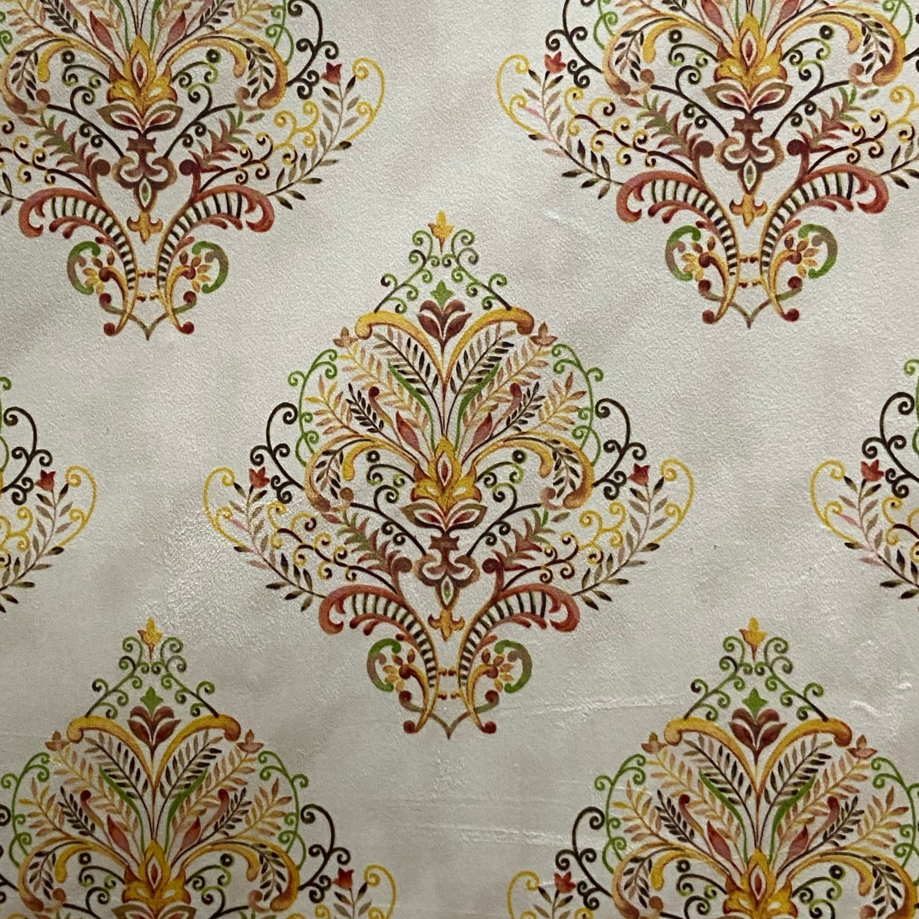 Decorative fabric pattern with Orange designs on a taupe background
