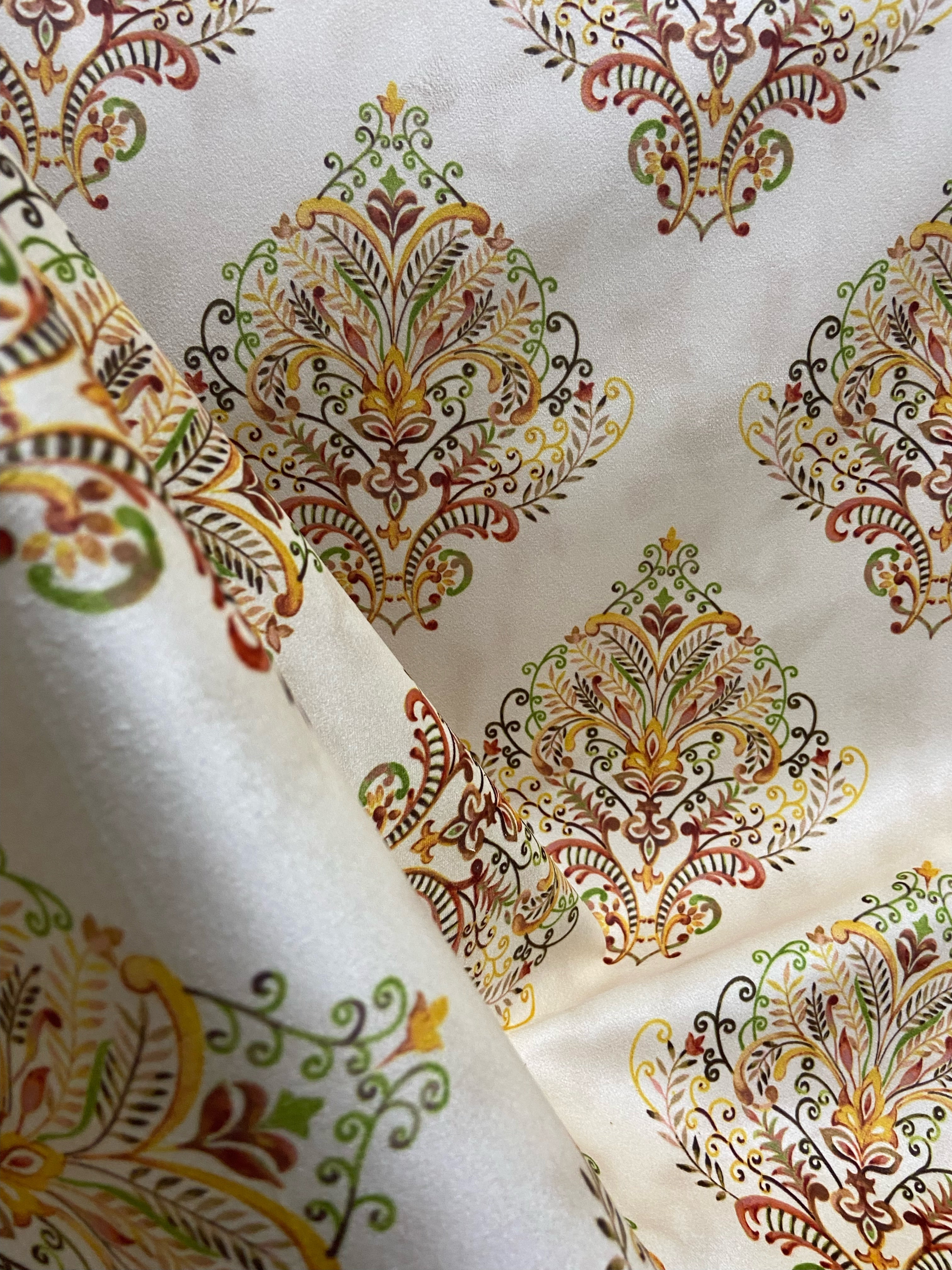 Decorative fabric pattern with Orange designs on a taupe background