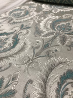 Sapphire blue damask fabric swatch showing repeat pattern detail