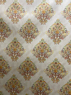 Decorative fabric pattern with Orange designs on a taupe background