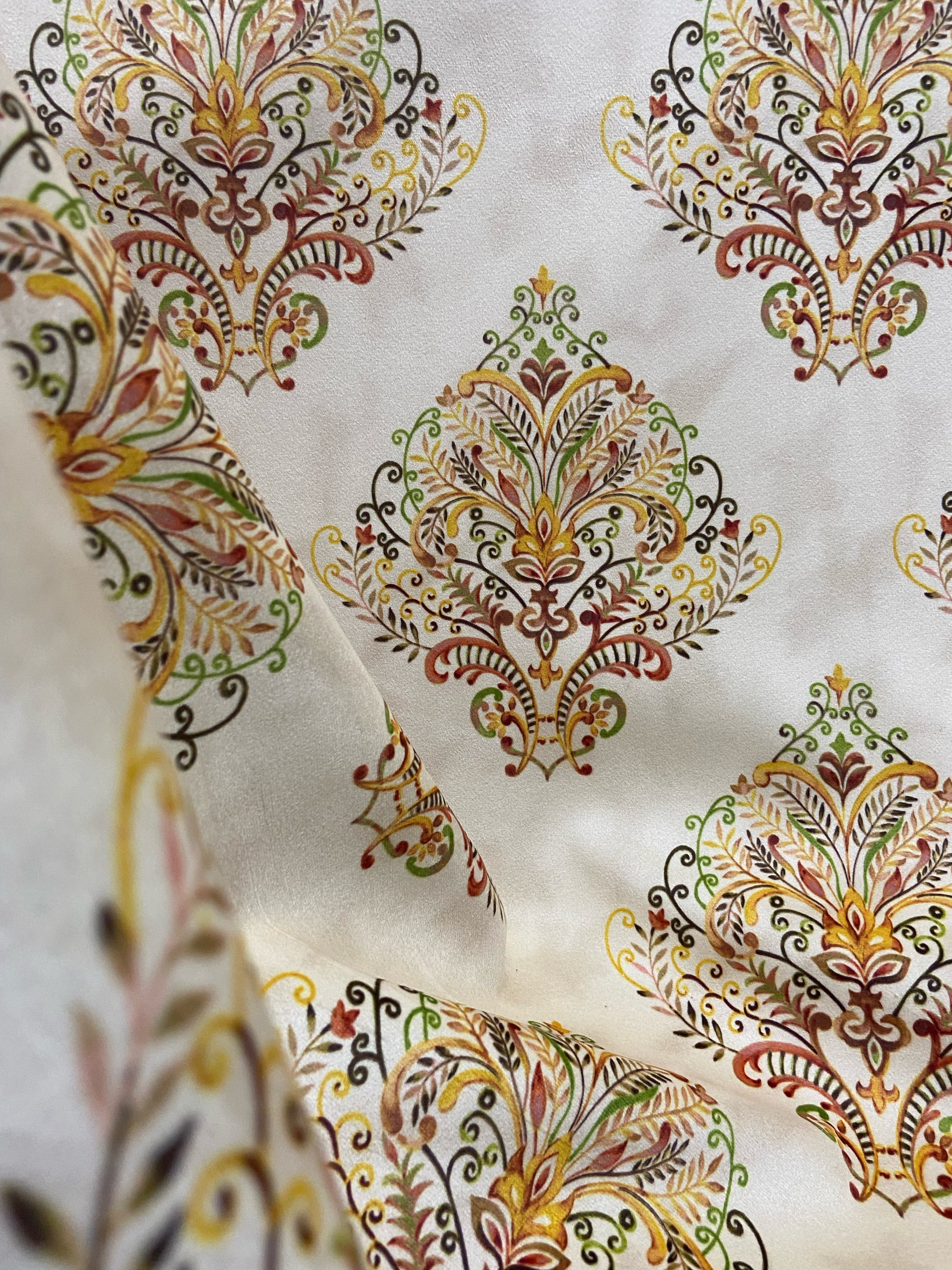 Decorative fabric pattern with Orange designs on a taupe background