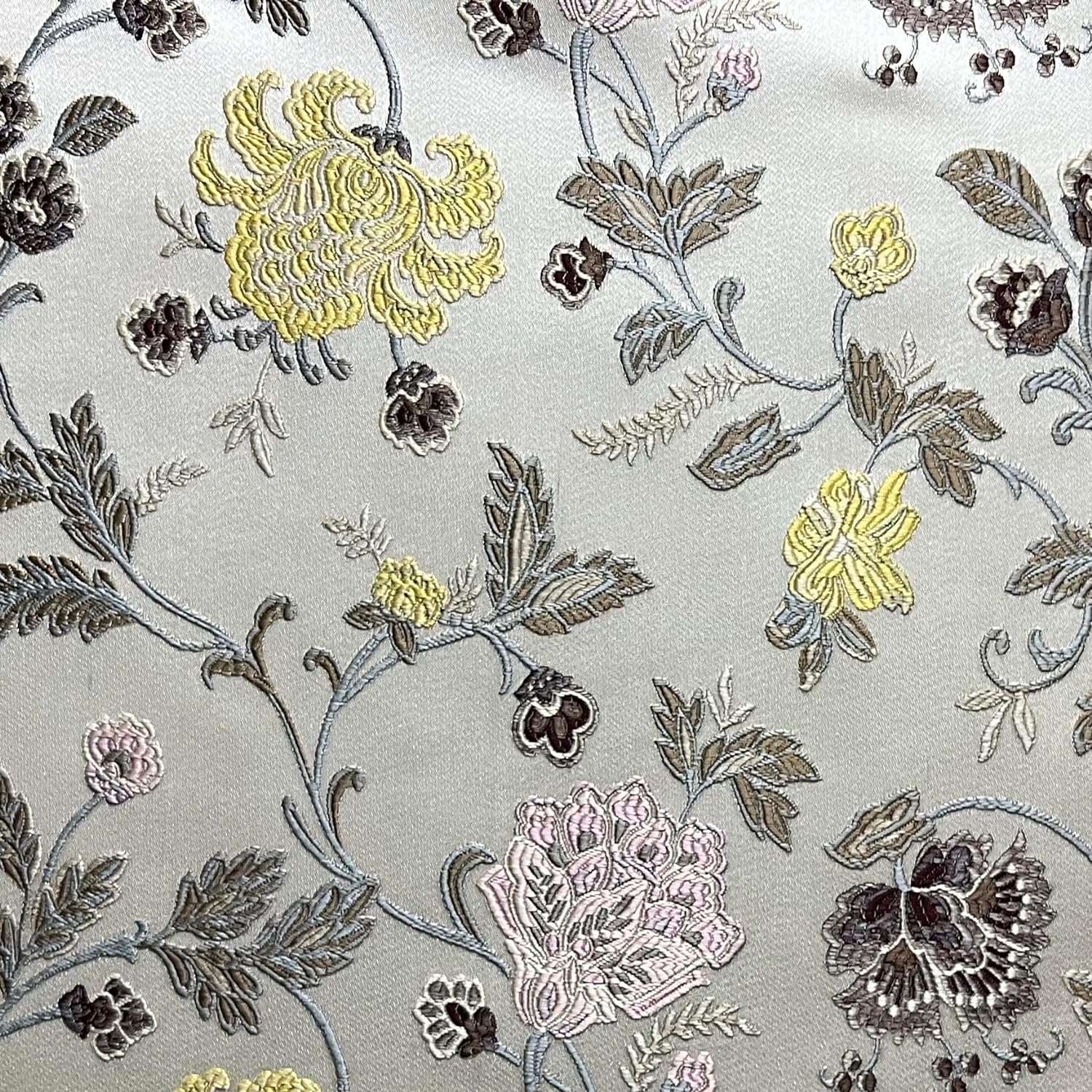 Embroidered Yellow floral pattern on fabric