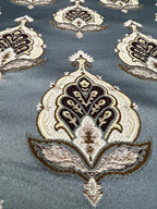 Patterned fabric with decorative Medallion Motif design on a Blue background