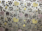 Embroidered Yellow floral pattern on fabric