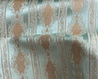 Decorative fabric with a stripe pattern on a Pista background