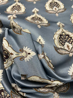 Patterned fabric with decorative Medallion Motif design on a Blue background