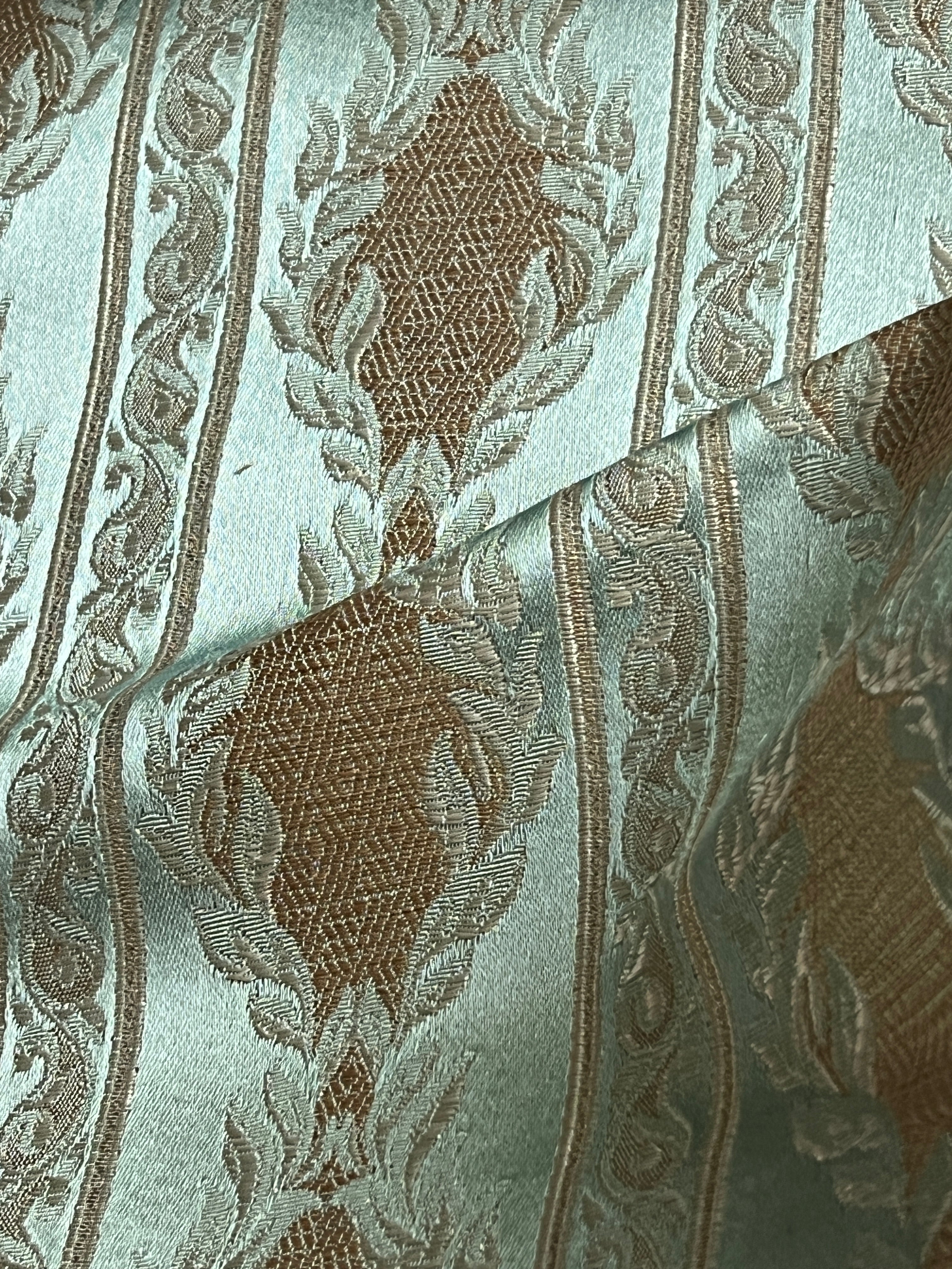 Decorative fabric with a stripe pattern on a Pista background