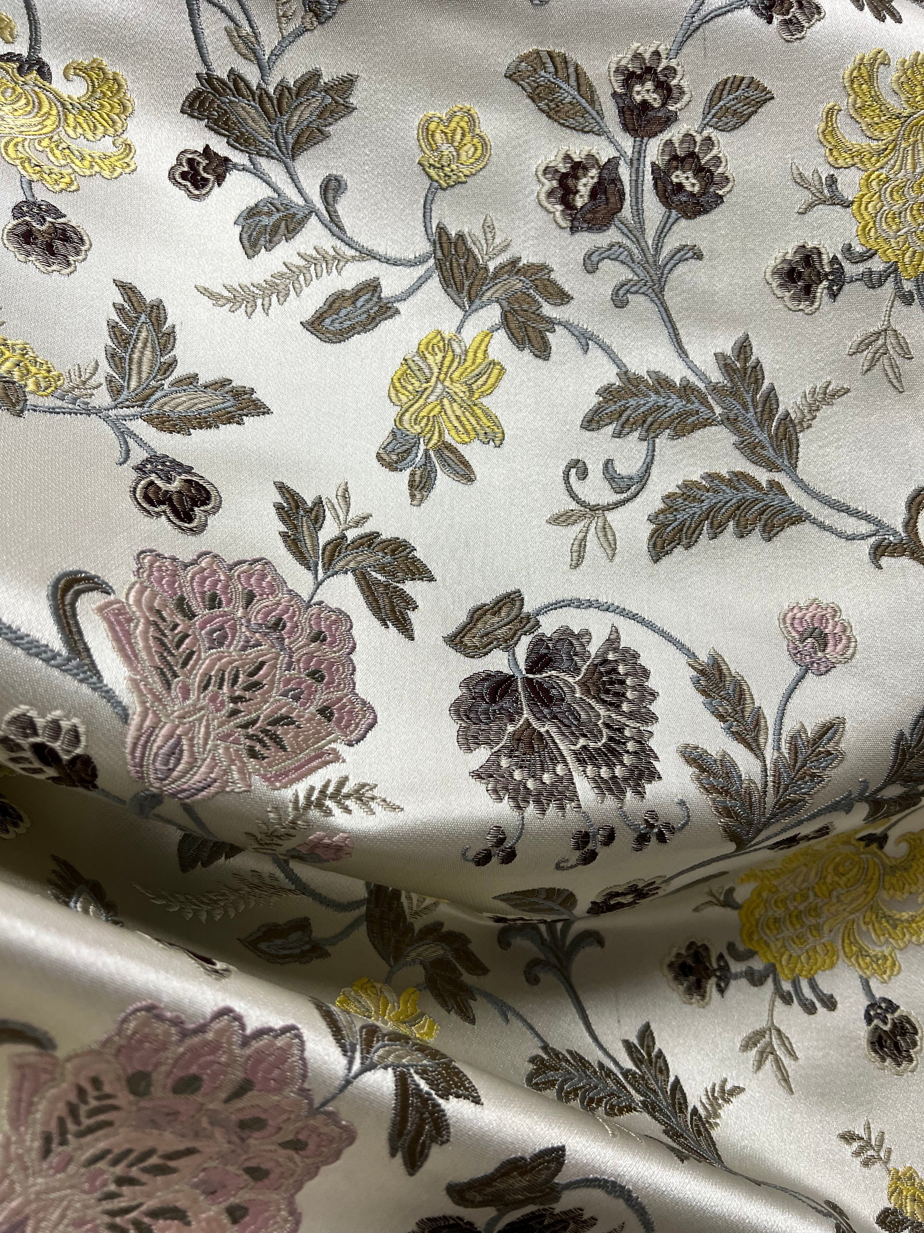 Embroidered Yellow floral pattern on fabric