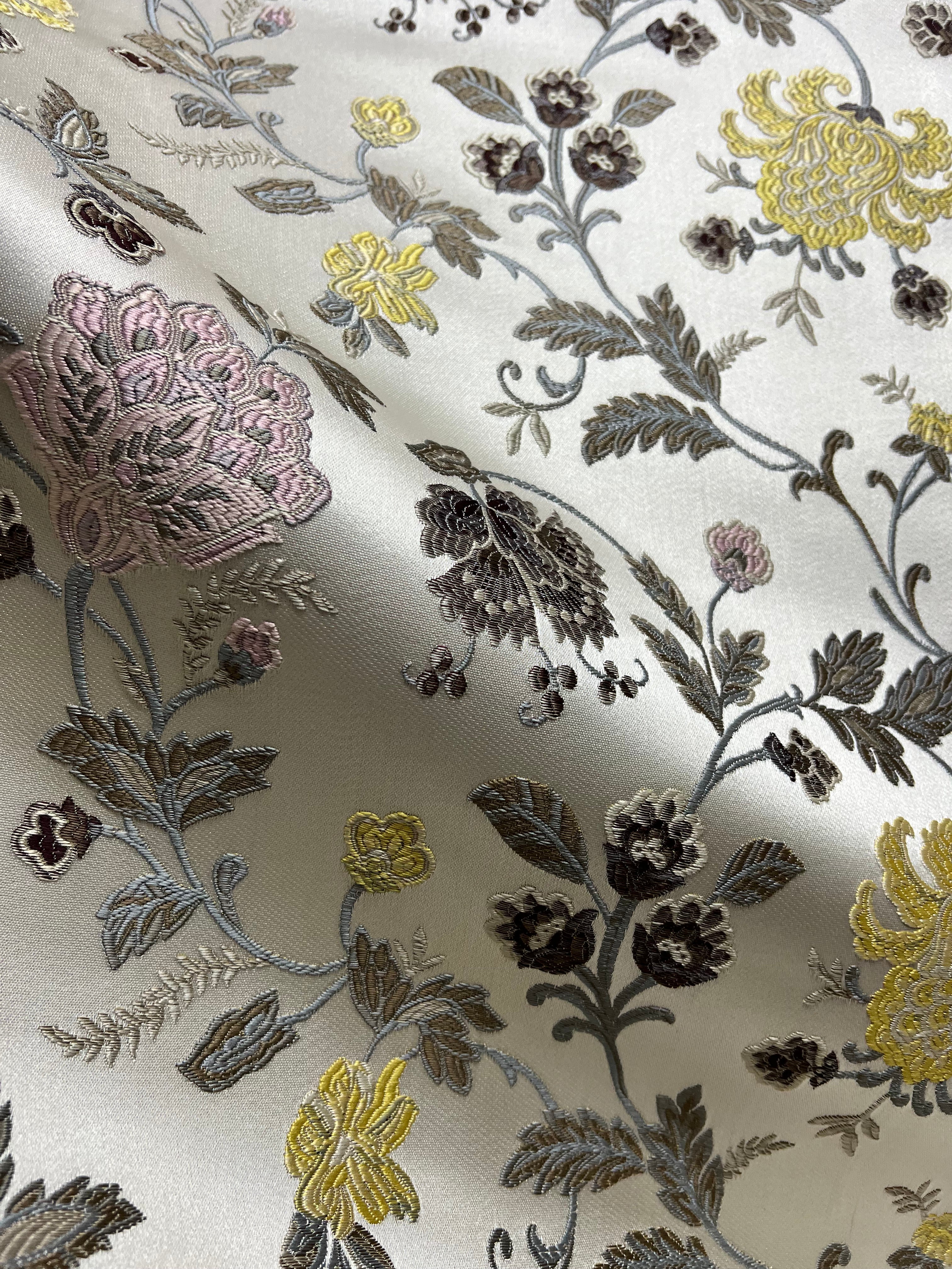 Embroidered Yellow floral pattern on fabric