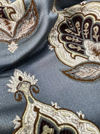Patterned fabric with decorative Medallion Motif design on a Blue background