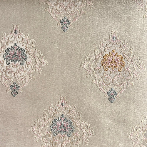 Decorative fabric with intricate patterns on a Pinkish background