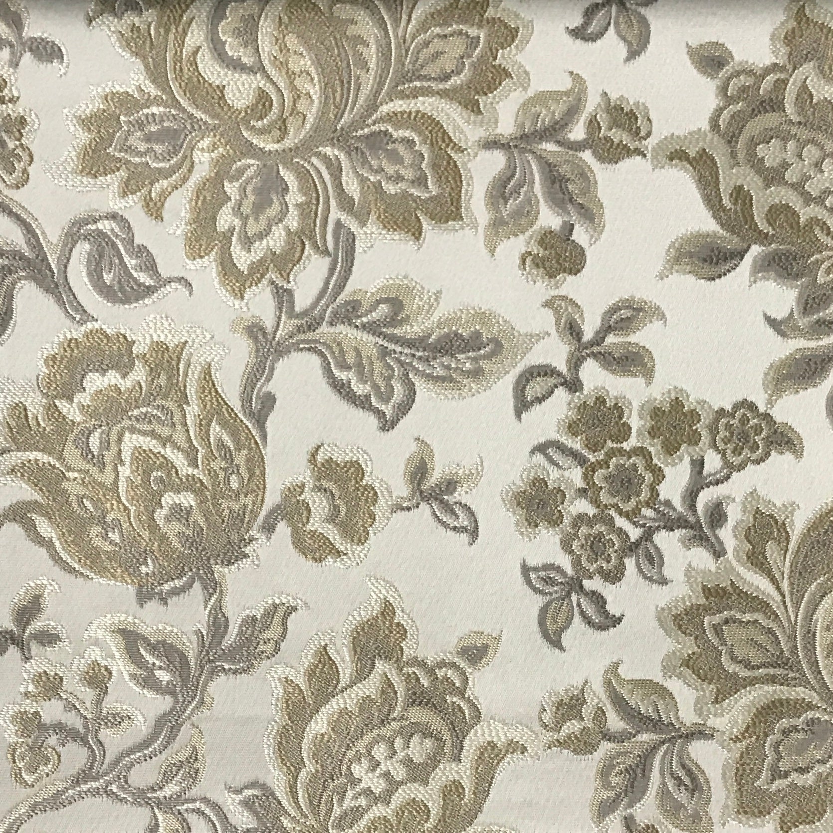 Gold floral jacquard upholstery fabric by the yard, close-up pattern view.