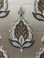 Patterned fabric with decorative Medallion Motif design on a Beige background