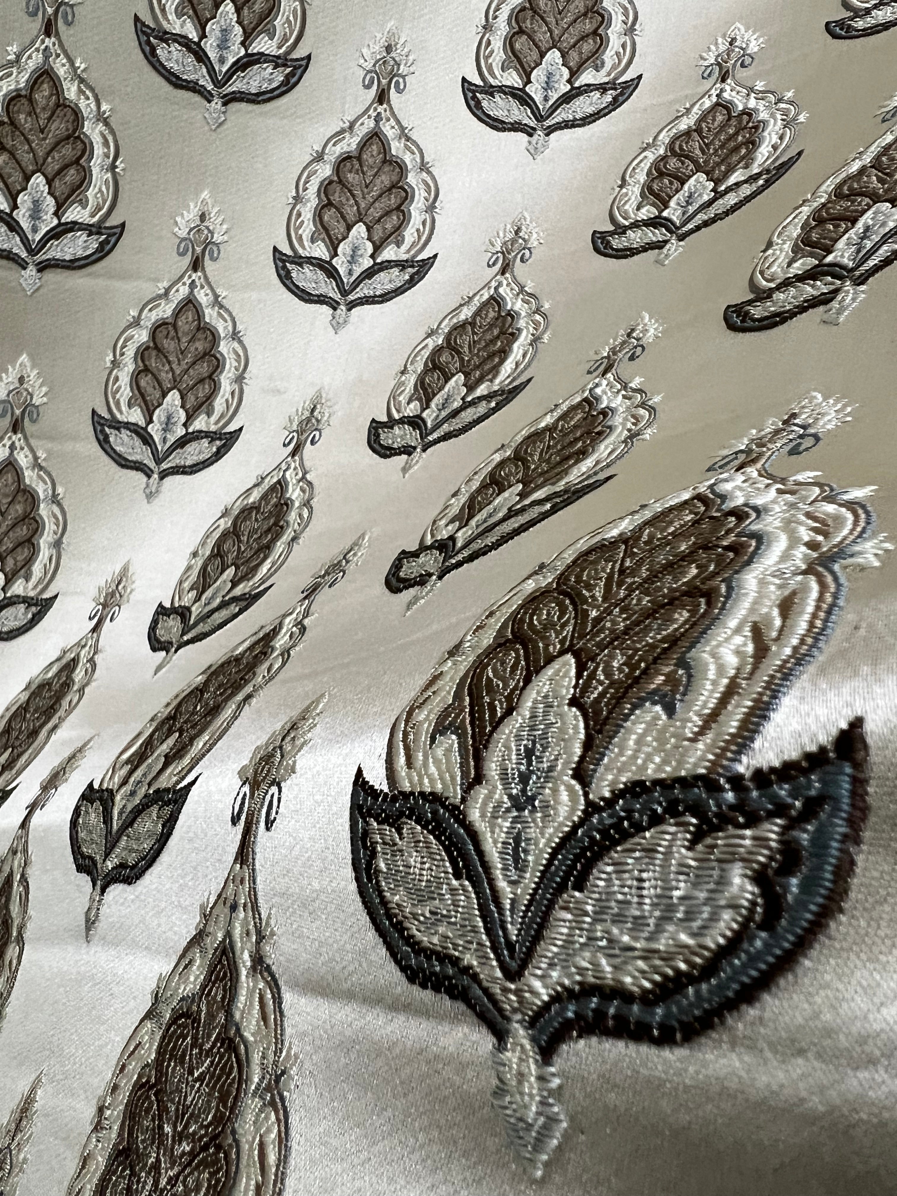 Patterned fabric with decorative Medallion Motif design on a Beige background