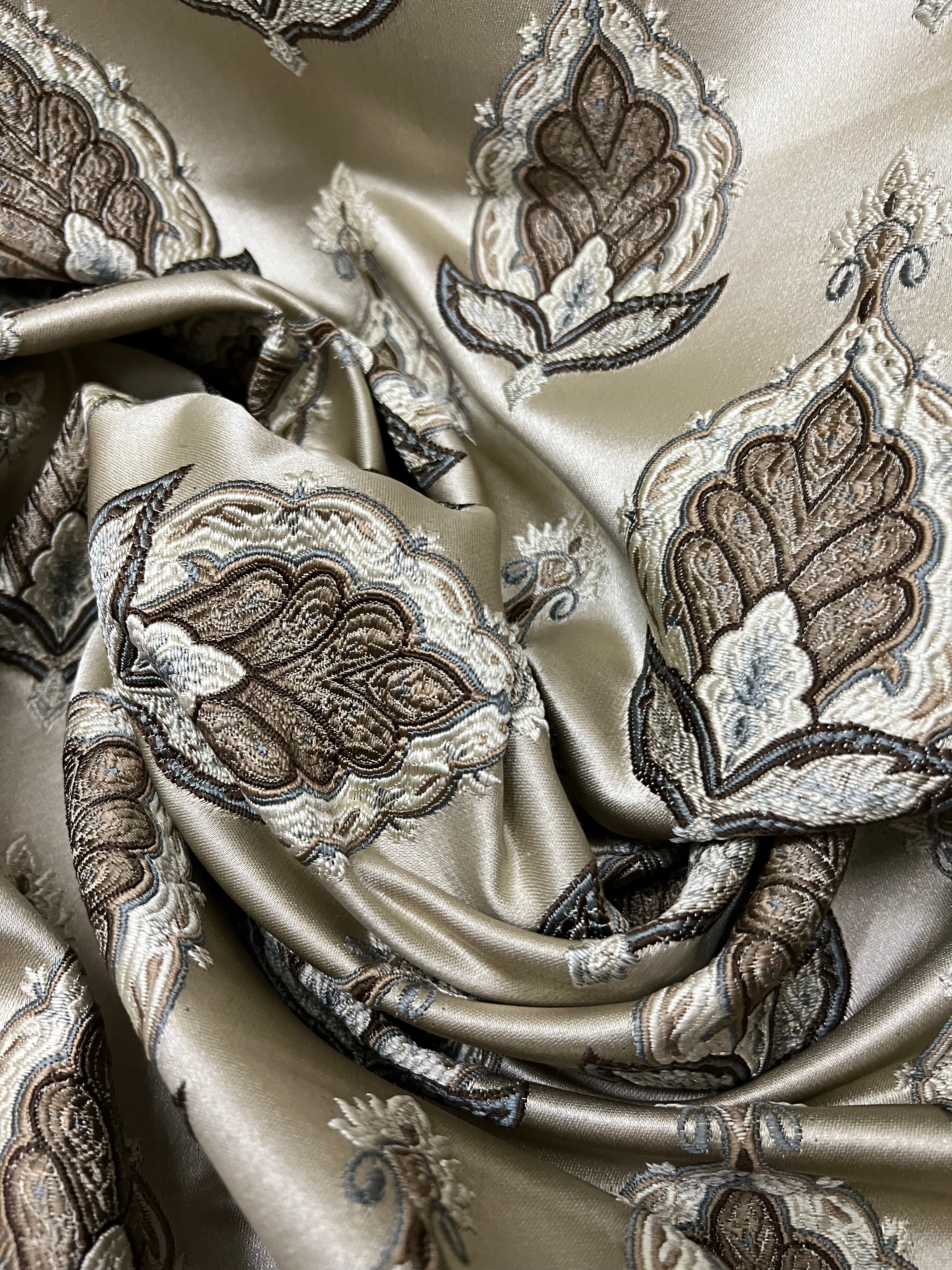Patterned fabric with decorative Medallion Motif design on a Beige background
