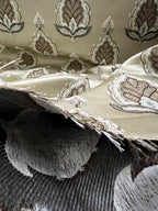 Patterned fabric with decorative Medallion Motif design on a Beige background