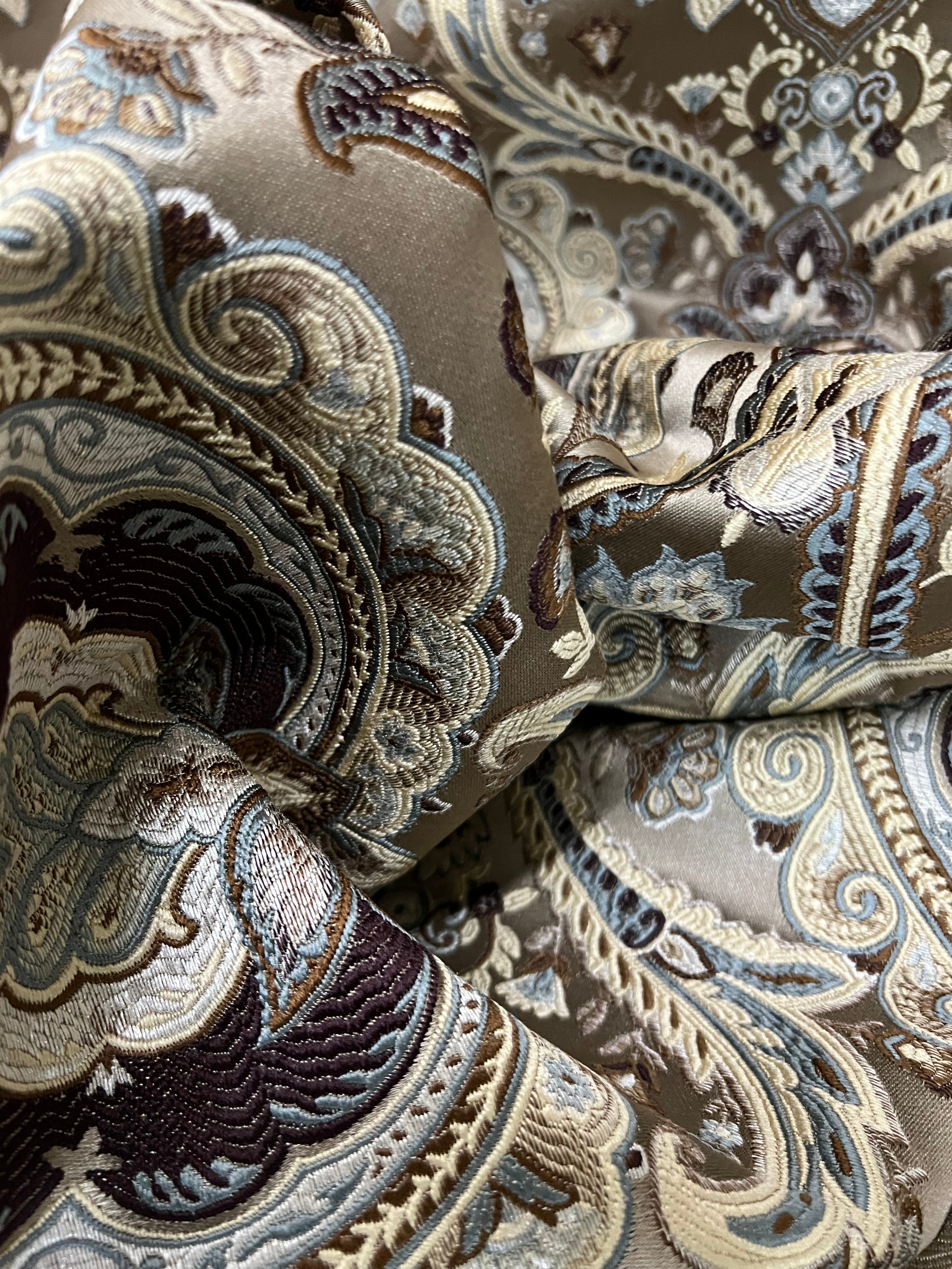 Decorative Baroque Paisley Medallion Damask Fabric on Brownish Maroon background