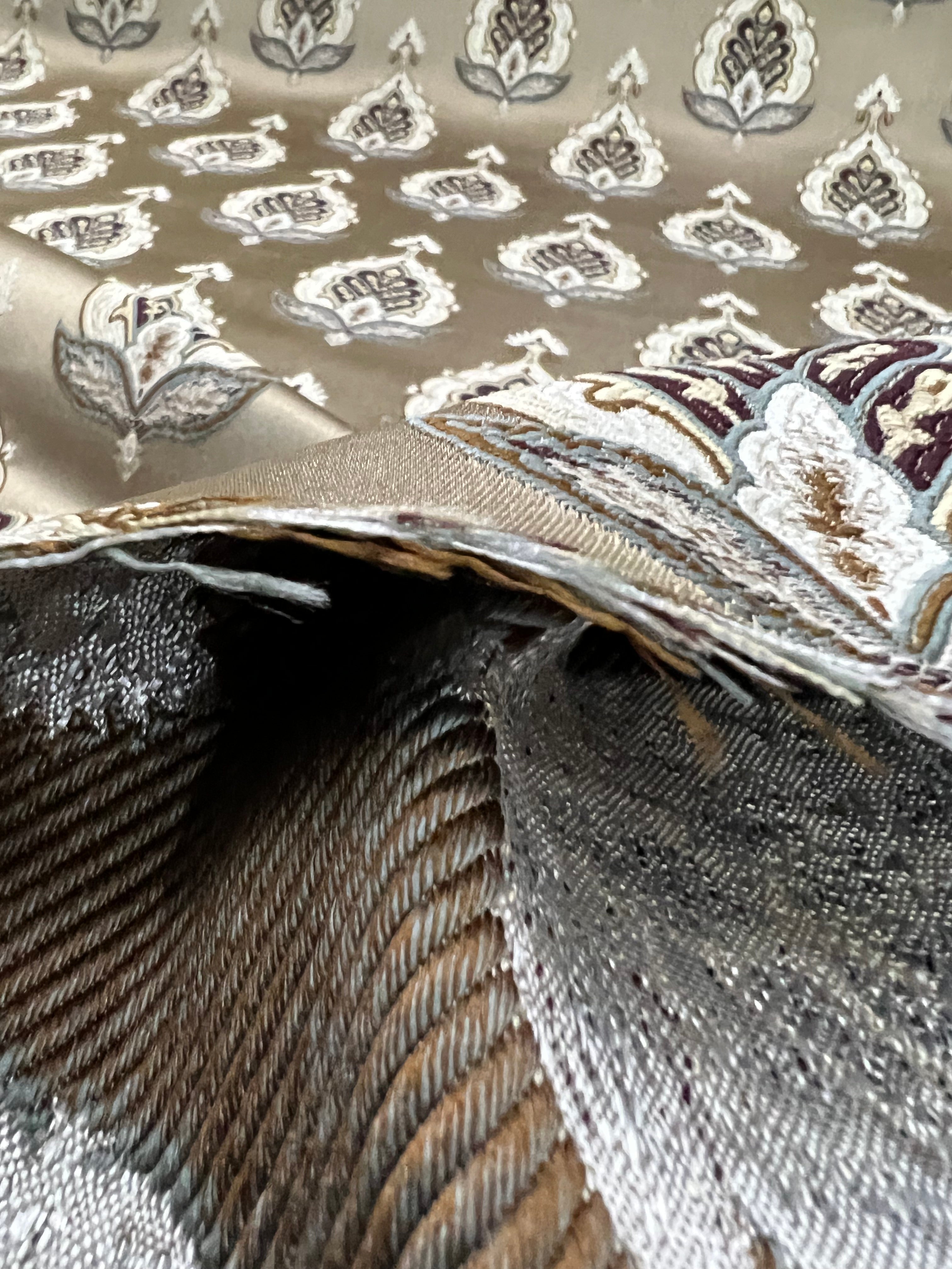 Patterned fabric with decorative Medallion Motif design on a Chocolate background