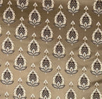 Patterned fabric with decorative Medallion Motif design on a Chocolate background