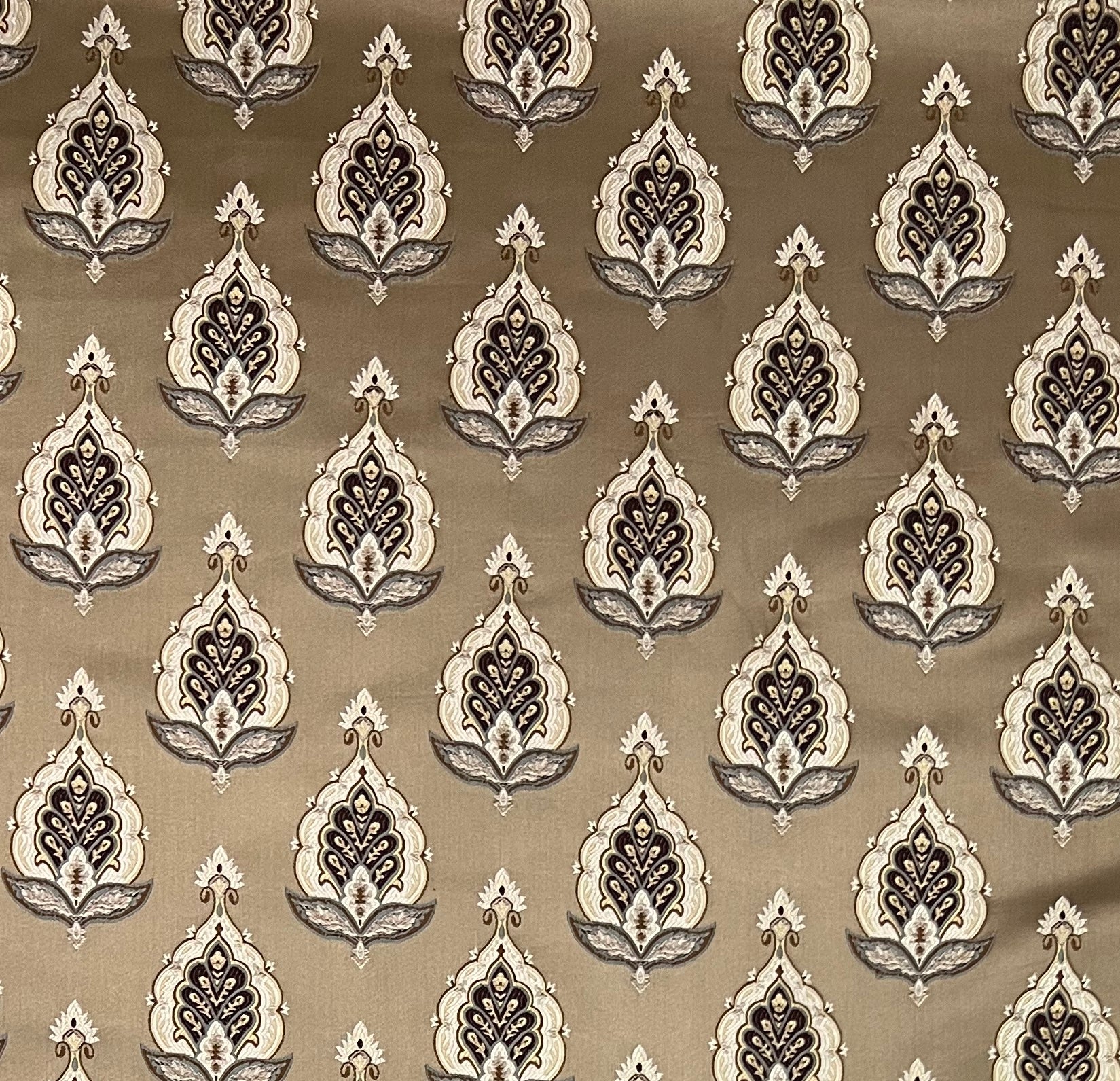 Patterned fabric with decorative Medallion Motif design on a Chocolate background