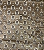 Patterned fabric with decorative Medallion Motif design on a Chocolate background