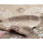 Decorative floral and damask pattern on a Beige background
