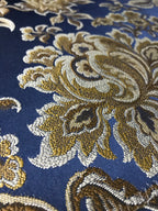 Navy floral jacquard fabric swatch showing repeat pattern detail.