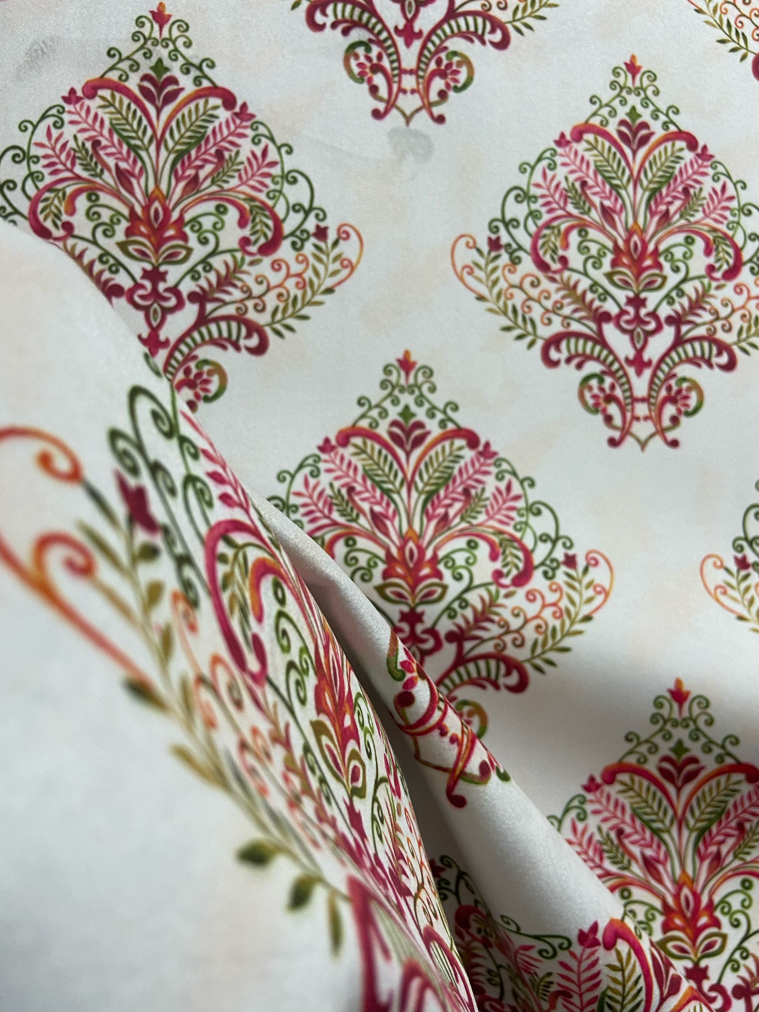 Decorative fabric pattern with Maroon designs on a taupe background