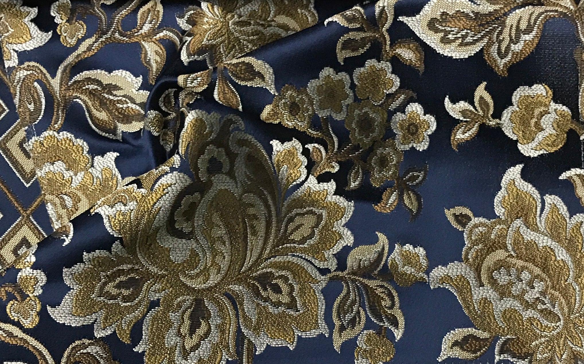Navy floral jacquard fabric by the yard, full pattern layout view.