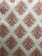 Decorative fabric pattern with Maroon designs on a taupe background