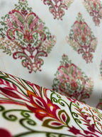 Decorative fabric pattern with Maroon designs on a taupe background
