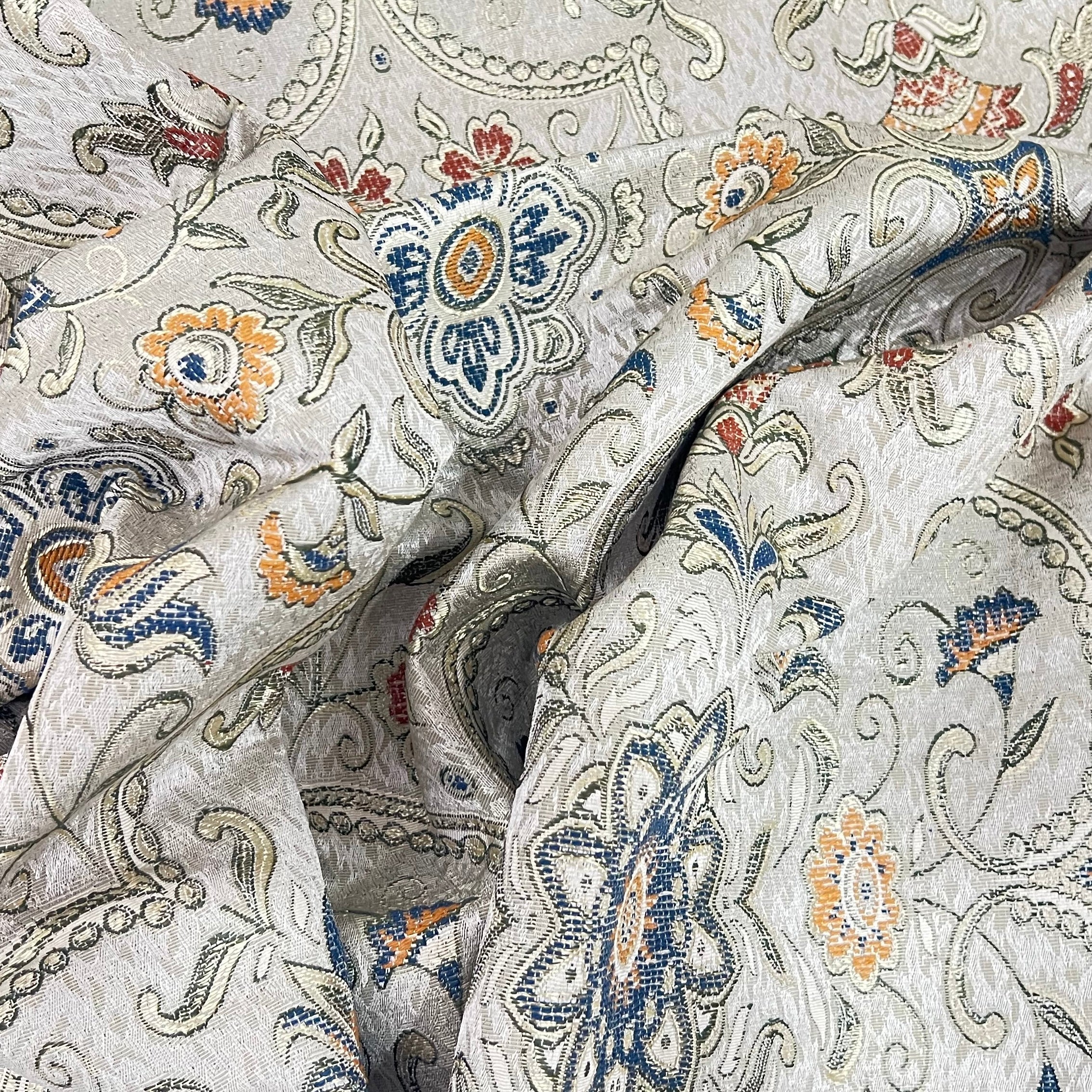 Royale Kasbah Ornate Silver with Blue jacquard fabric for sofa couch reupholstery rich weave close-up
