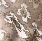 Decorative floral and leaf pattern on a light Peach background