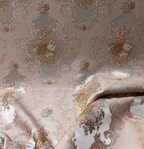 Decorative floral and leaf pattern on a light Peach background