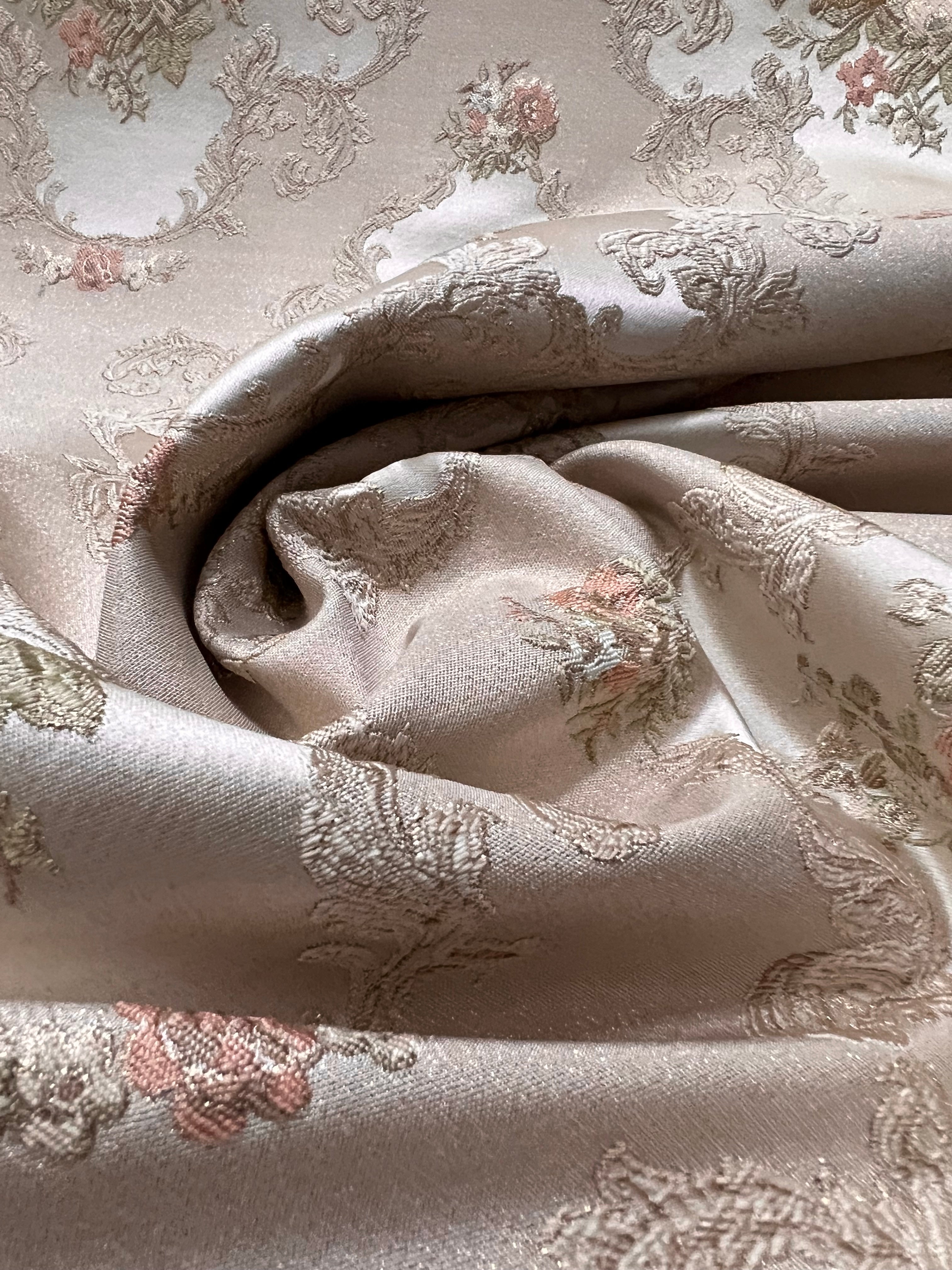 Decorative floral and leaf pattern on a light Peach background