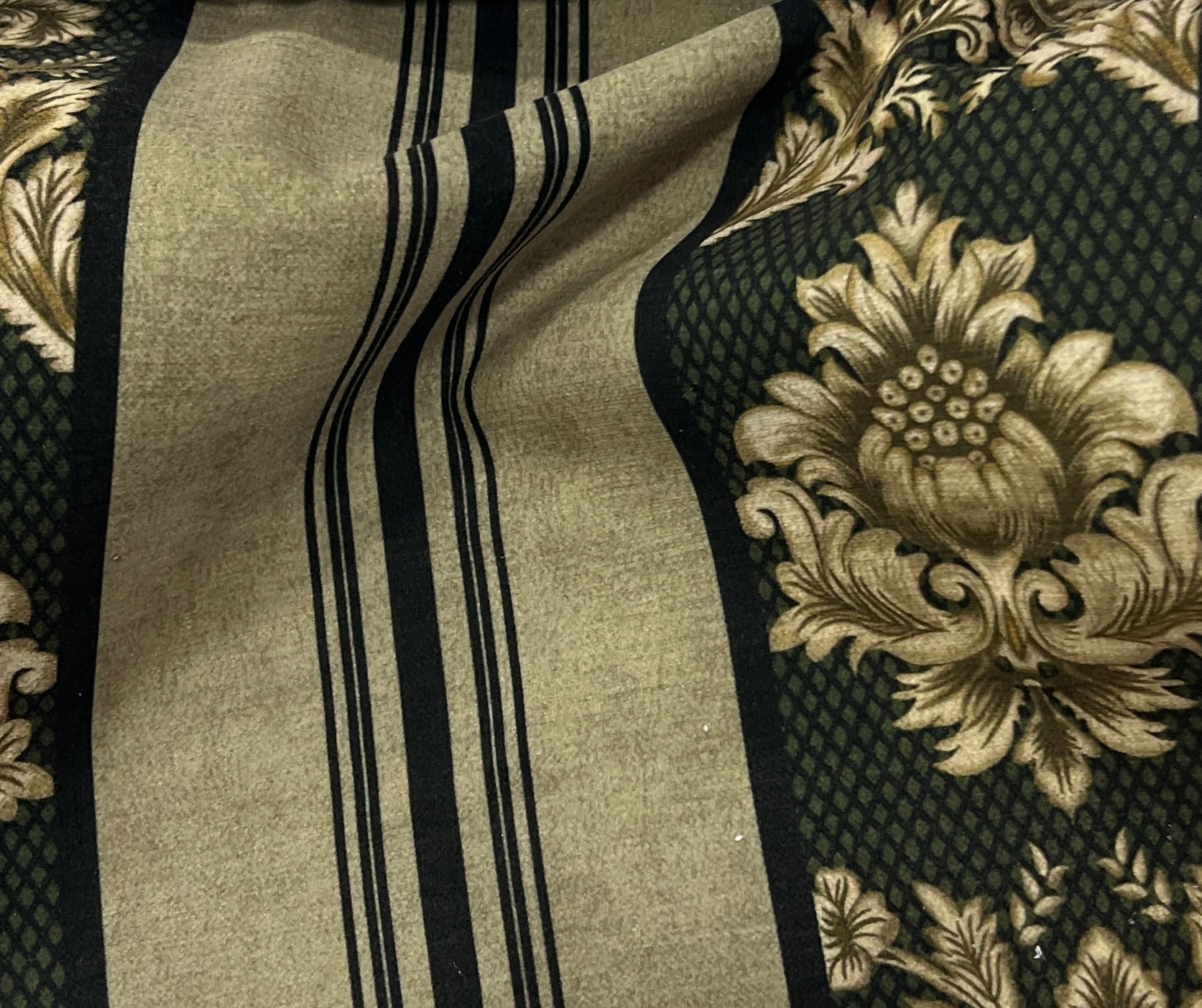 Decorative fabric with floral patterns in a striped design with Emerald Gold  background