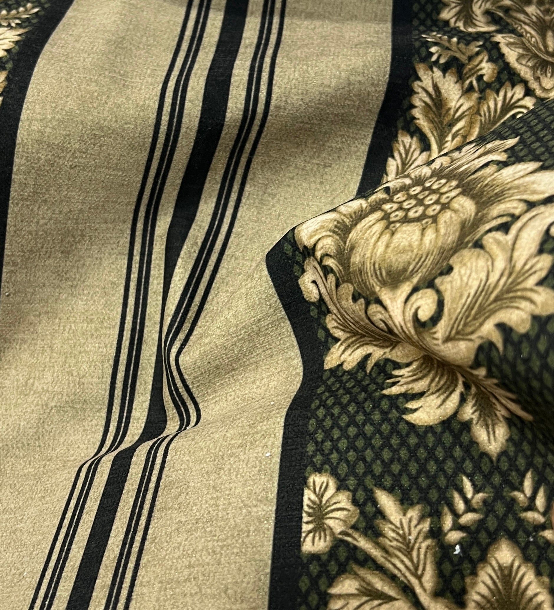 Decorative fabric with floral patterns in a striped design with Emerald Gold  background