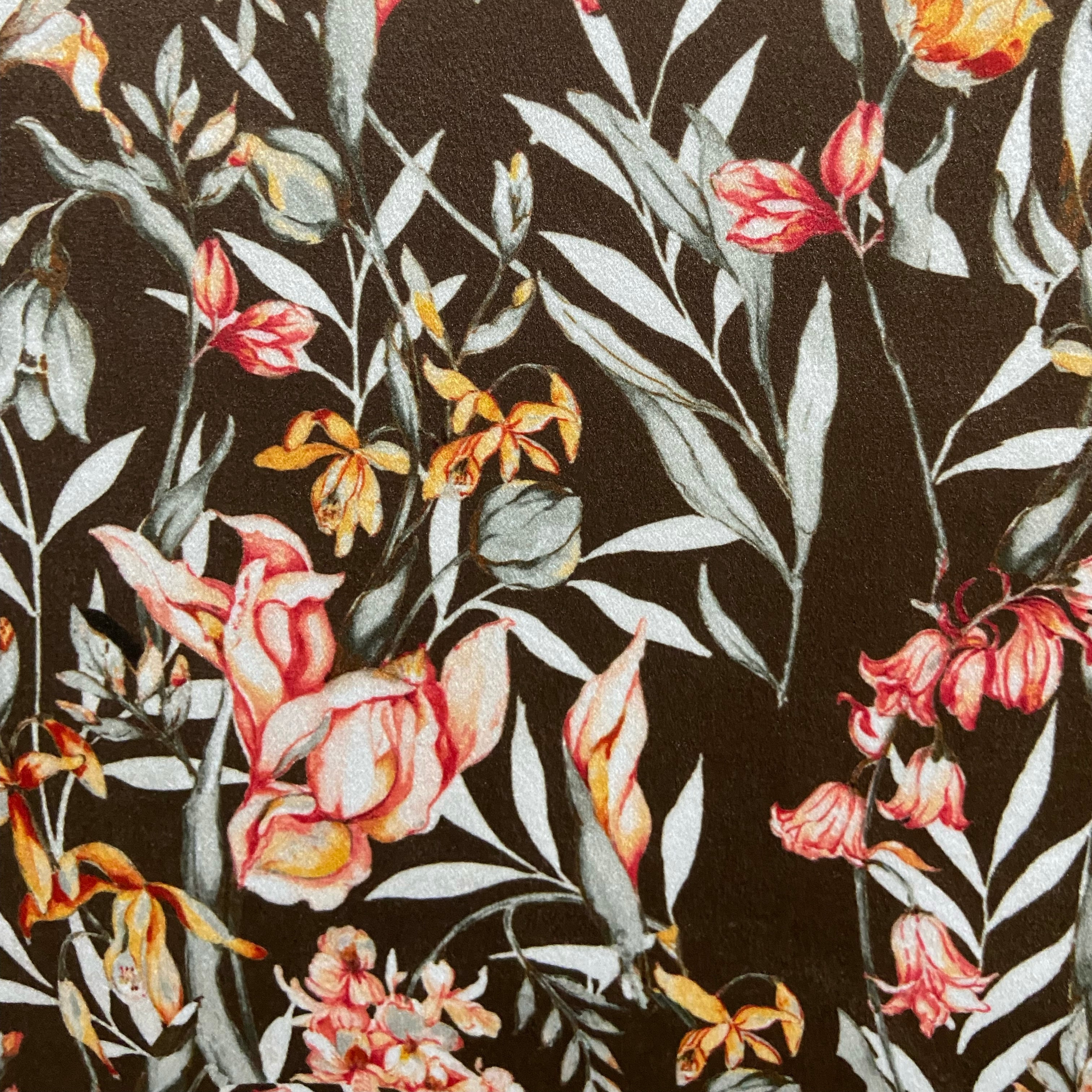 Floral pattern with green leaves and white flowers on Wood colored background