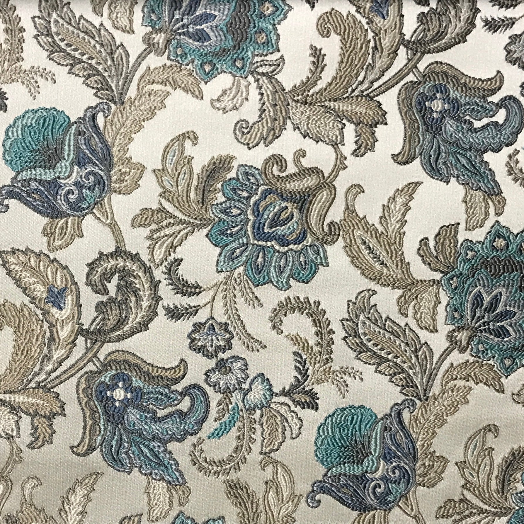 Decorative fabric with floral pattern in Teal Sage colors