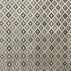 Patterned fabric with geometric design in blue, beige, and brown tones. Teal Sage