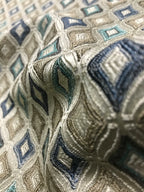 Close-up of patterned fabric with geometric design Teal Sage