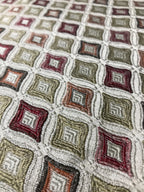 Close-up of a textured fabric with geometric pattern Sage Rose