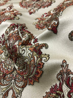 Close-up of intricate paisley pattern on fabric Sage Rose