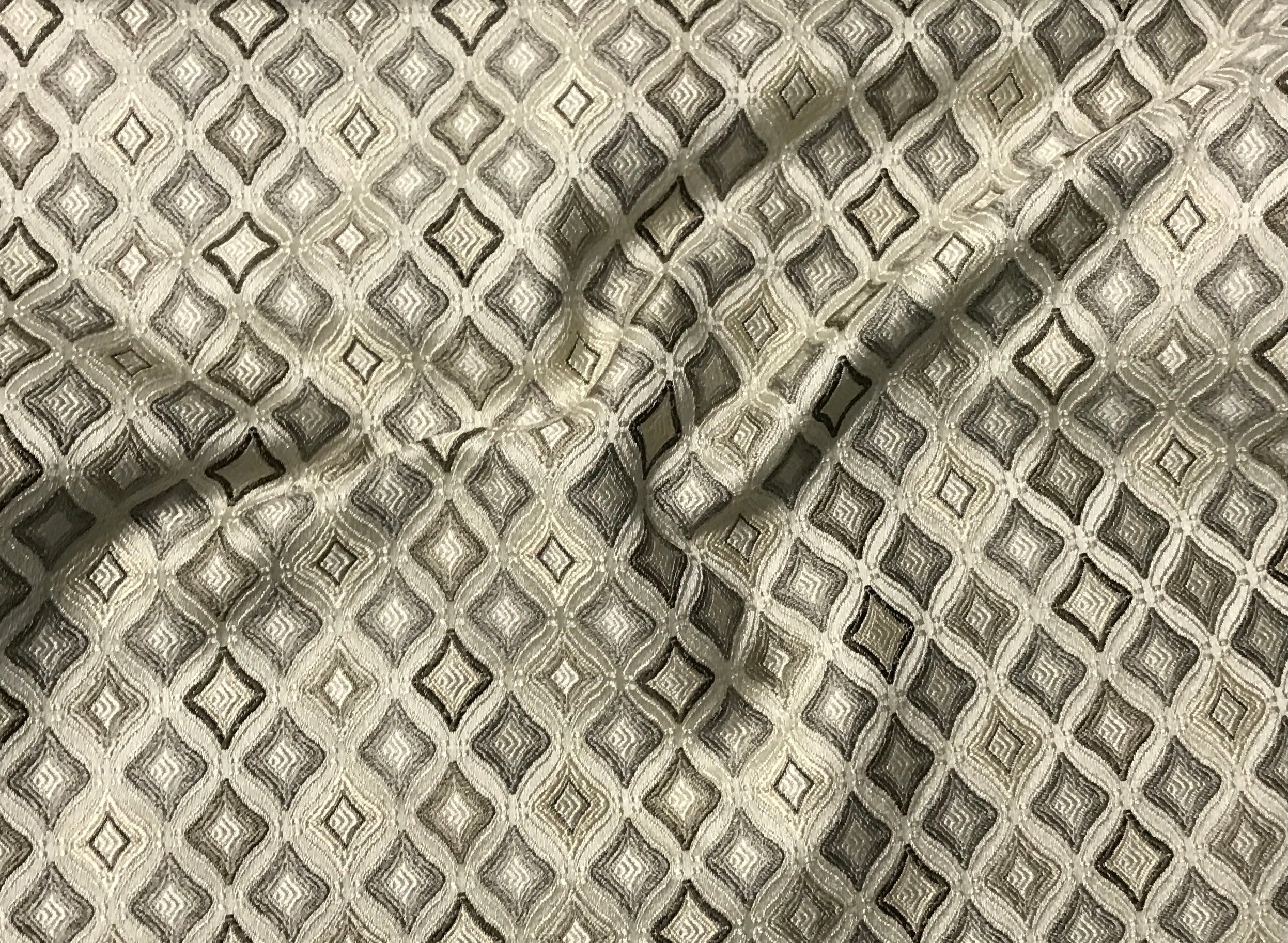 Close-up of textured fabric with diamond pattern Stone Age