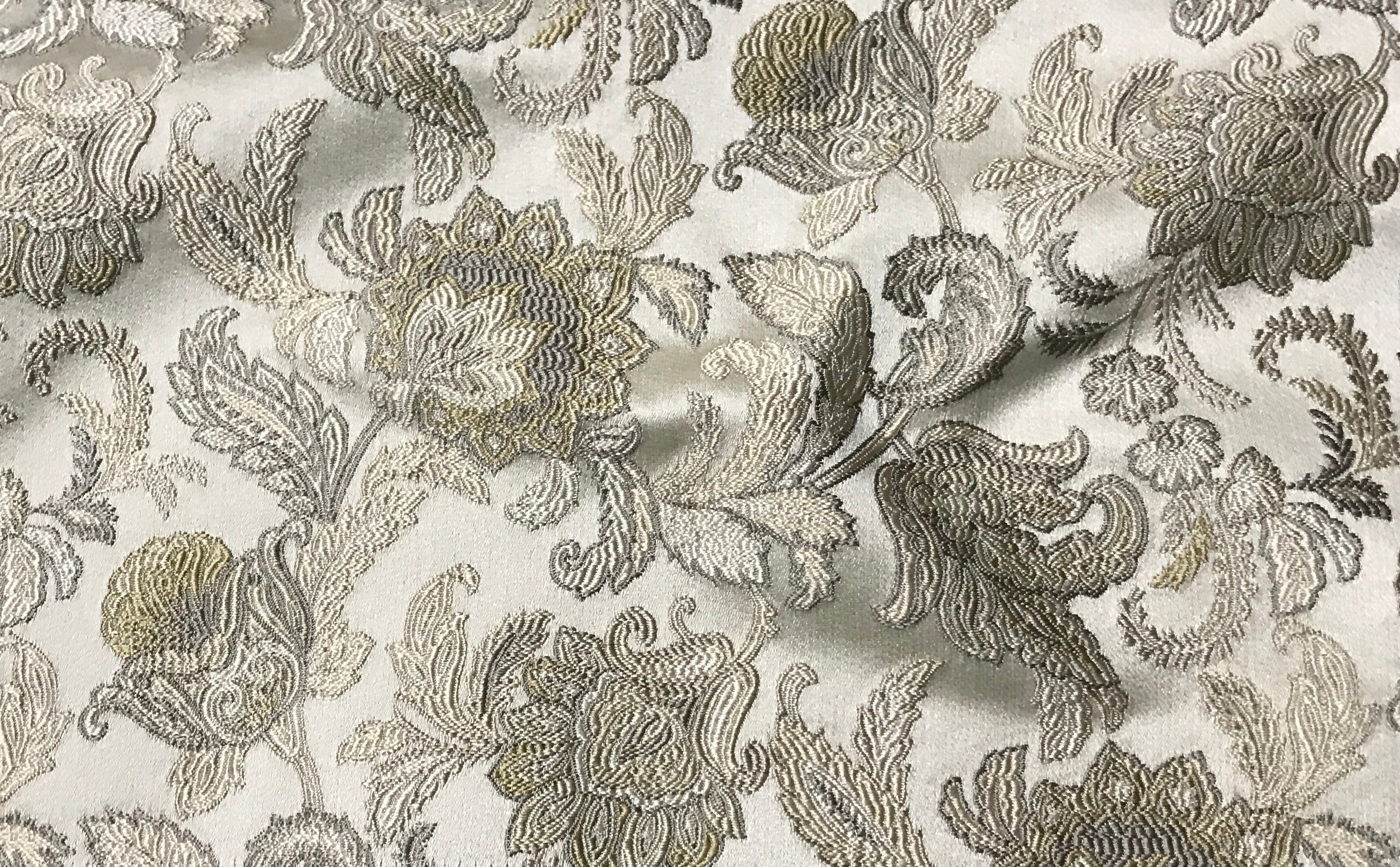 Decorative fabric with intricate floral pattern on a white background Olive Sage