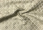 Close-up of textured fabric with diamond pattern Olive Sage