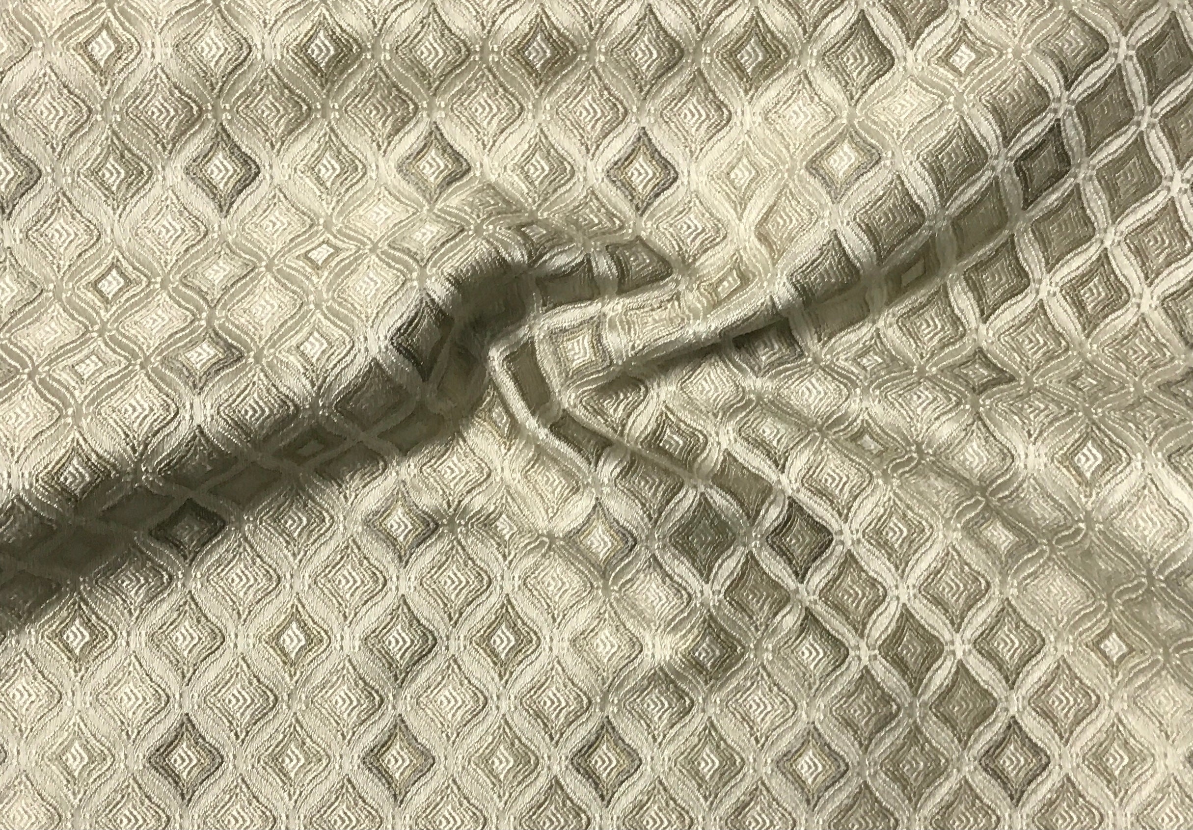Close-up of textured fabric with diamond pattern Olive Sage