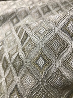 Close-up of textured fabric with geometric pattern Olive Sage