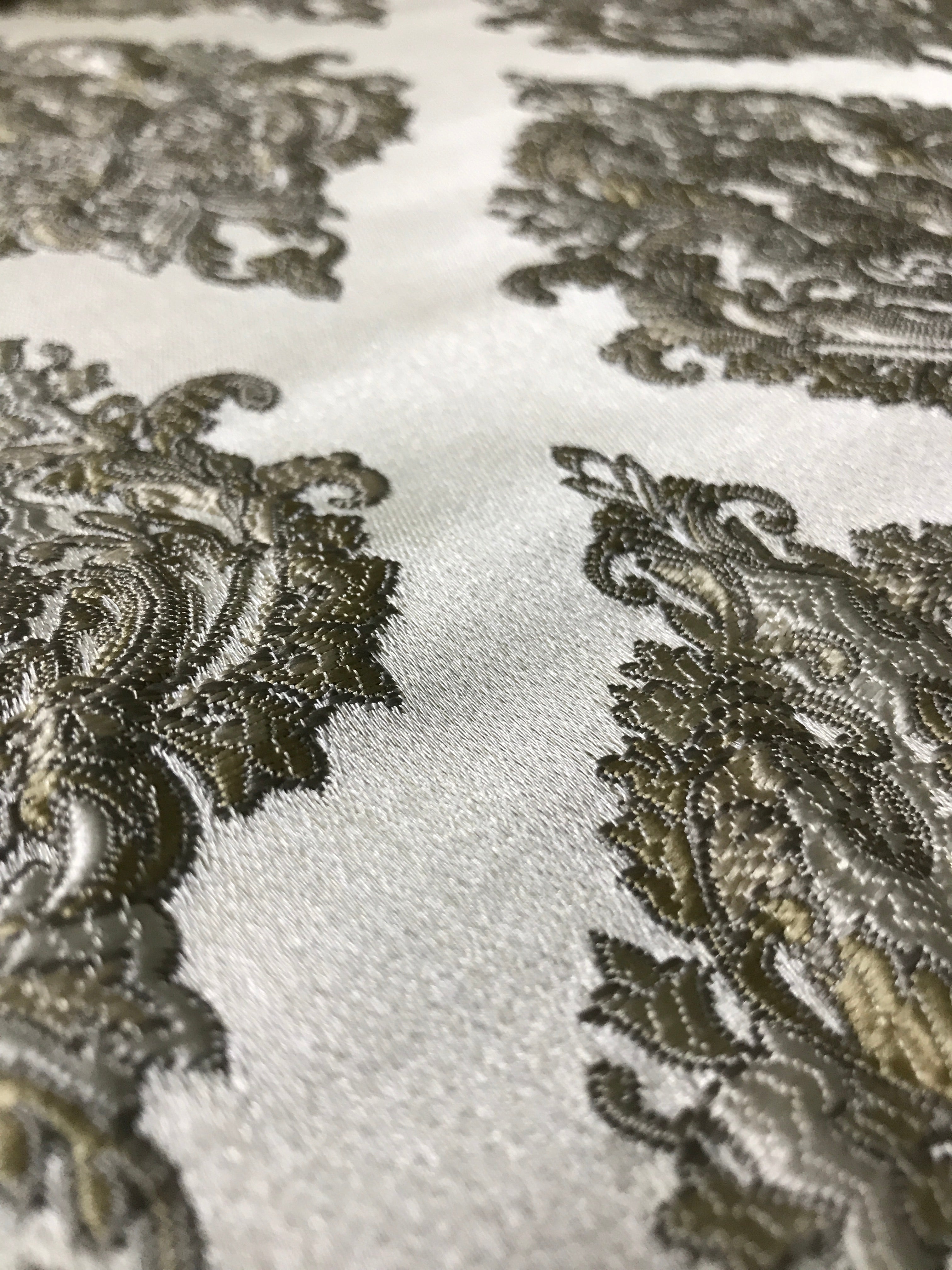 Close Up of intricate patterns damask jacquard Olive Sage